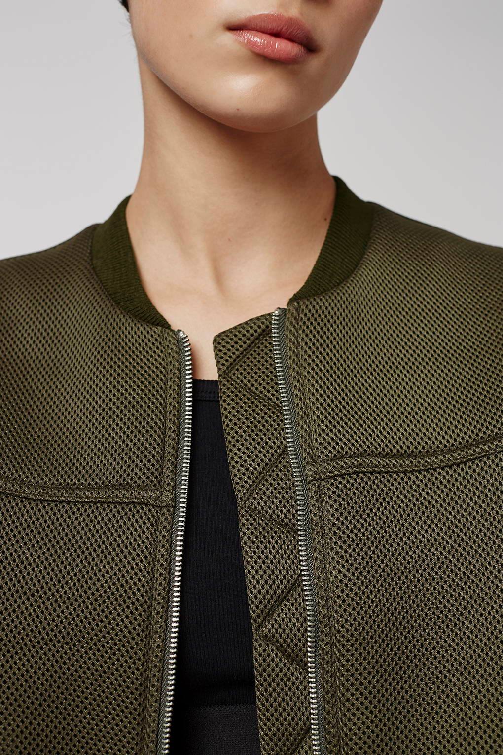 Geaca bomber cu buzunare oblice